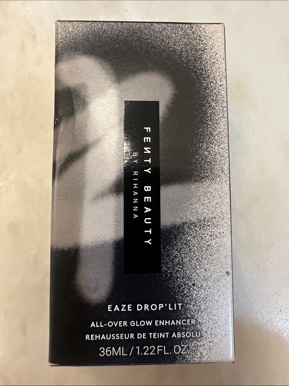 Fenty Beauty Eaze Drop'Lit All-Over Glow Enhancer - Silver Gray Packaging Taffy
